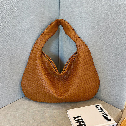 JADE - Luxuriöse geflochtene Handtasche